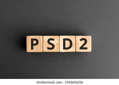 PSD2 - acronym from wooden blocks with letters, Payment Service Directive 2 PSD2 online payment and ecommerce concept,  top view on grey background - Shutterstock ID 1543636256