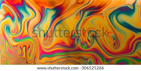 Psychedelic abstract background formed by soap bubble reflecting light