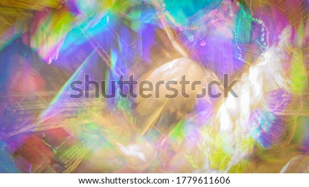 Psychedelic abstract background watercolor pattern. Trippy light exposure with swirling rainbow colors 