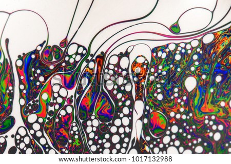 Psychedelic abstract formed by light interference on the surface of a soap bubble