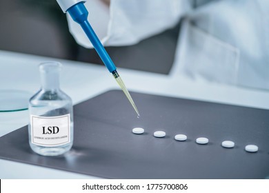 Psychedelic drug LSD therapy research, scientist preparing small doses of LSD in laboratory for an experimental treatment of psychiatric disorders