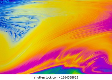 Psychedelic multicolored patterns background. Photo macro shot of soap bubbles