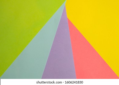Psychedelic trip with pyramid shape. Bright yellow, pink, purple, blue and green colors. Flat lay concept.  - Shutterstock ID 1606241830