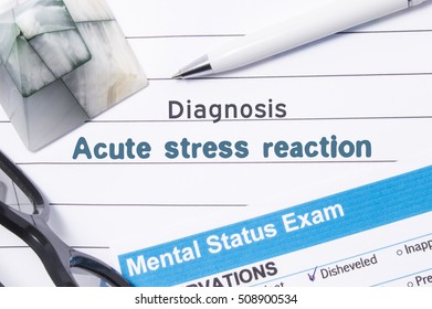 
Psychiatric Diagnosis Acute Stress Reaction. Medical Book Or Form With The Name Of Diagnosis Acute Stress Reaction Is On Table Of Doctor Surrounded By Questionnaire To Determine Mental State