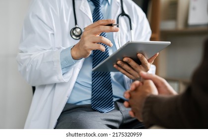 The psychiatrist examines the patient and talks to the patient about the symptoms. best medical service concept in hospital - Shutterstock ID 2175320959