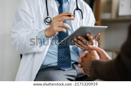 The psychiatrist examines the patient and talks to the patient about the symptoms. best medical service concept in hospital