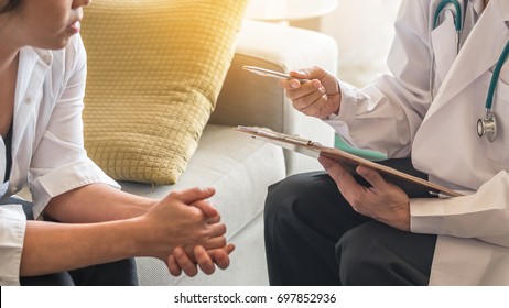 Psychiatrist Or Gynecologist Doctor Consulting And Having Diagnostic Examination On Woman Patient's Health Depression In Medical Clinic Or Hospital Exam Room Office