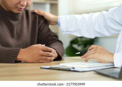 Psychiatrist Or Professional Psychologist Holding Shoulder Of Male Patient Closeup To Heal Suffering And To Give Encouragement To Feel Relaxed.Encouraging, Therapy.Psychological Support Concept