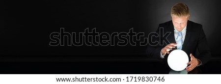 Psychic Predicting Future Using Crystal Ball. Business Visionary