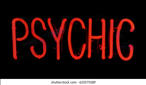 Psychic Red Neon Light Sign Glowing At Night.