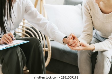 psychological consultation young Asian specialist psychologist or coach conducts a session for a patient of a young woman, problem solving, mental health - Shutterstock ID 2181309191