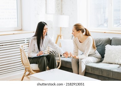 psychological consultation young Asian specialist psychologist or coach conducts a session for a patient of a young woman, problem solving, mental health - Shutterstock ID 2182913051