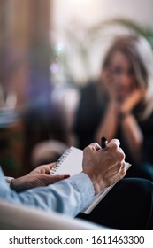 Psychological Therapy - Blurred Woman Talking To Psychotherapist In Cognitive Behavioral Therapy Session