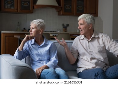 Psychological violence. Mature family couple come through marriage crisis relationship problems. Angry irritated jealous old age husband abuser yell scold stressed upset senior wife control her life