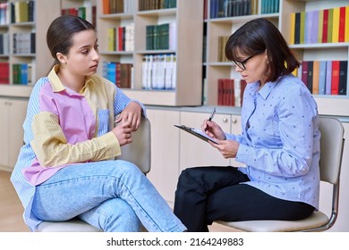 Psychologist, High School Behavior Counseling Teenage Student In Library