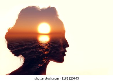 Psychology concept. Sunrise and woman silhouette. - Shutterstock ID 1191120943