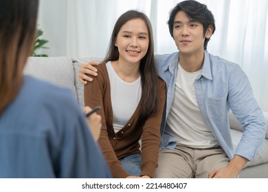 Psychology, depression asian young couple love, patient consulting problem mental health with psychologist, psychiatrist at clinic together, husband embracing shoulder of wife, therapy health care. - Powered by Shutterstock