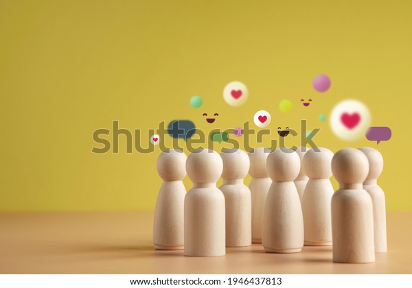 Psychology Personality Concept. Extrovert Person.\
person who Happy and Enjoy by Talking, Interaction, Party Often.\
presenting by wooden peg\
dolls
