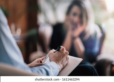 Psychology Therapy Session - Female Patient Talking to Mental Health Professional - Shutterstock ID 1611463294