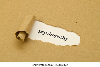 Psychopathy Word Written Under Torn Paper.