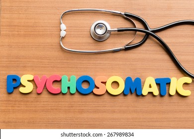 psychosomatic colorful word on the wooden background