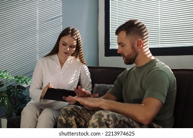 Psychotherapist working with military officer in office - Shutterstock ID 2213974625