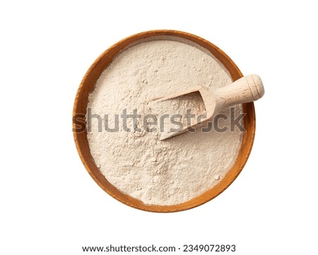 Psyllium husk flour powder on wood bowl and spoon isolated on white background. Health benefits of Psyllium flour concept.