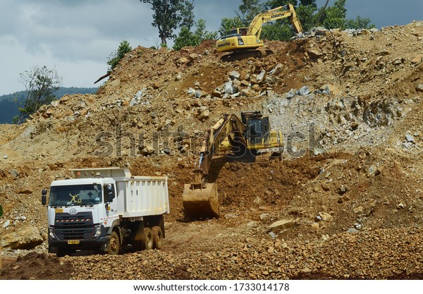 PT VALE MINE PROCESS 28 March 2019 Heavy equipment\
operates in the mining area of ​​PT Vale Indonesia Sorowako, East\
Luwu Regency, South Sulawesi, Indonesia. PT Vale produces 200 to\
250 tons of Nickel