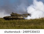 PT-91 Twardy T-72 tanks in use during the war in Ukraine, showcasing military vehicles and armored warfare.