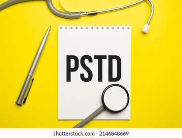 PTSD Text Written A On Paper With A Stethoscope. Medical Concept. High Quality Photo