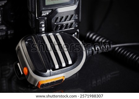 PTT switch - Microphone with push-to-talk button for two-way radio close-up