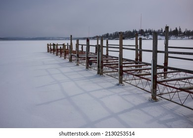 The Public Boat Dock At Skaneateles Lake Which Is One Of New York State's Finger Lakes, Is Closed For The Winter, Shown Here During A Cold Day With The Lake Frozen Over. 