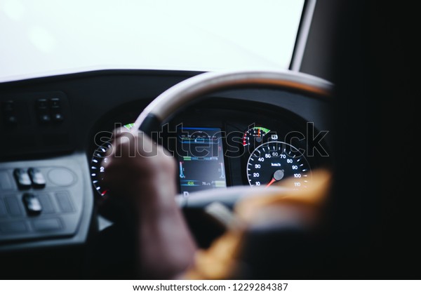 Public Bus Driver behind the\
wheel