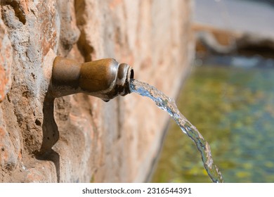Public drinking water fountain in a village in Andalusia, Spain.