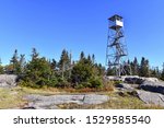 Public Firetower on top of summit in Adirondack Mountains in Autumn