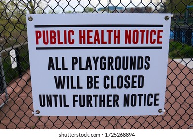 Public Health Notice Sign Posted At The Weehawken Waterfront Park In Weehawken, New Jersey During The 2020 Coronavirus Pandemic