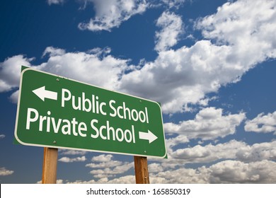 Public Or Private School Green Road Sign Over Dramatic Clouds And Sky.