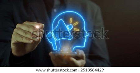 Public Relations concept, the practice of managing and disseminating information from an individual or an organization to the public. Megaphone icon and human head on virtual screen.