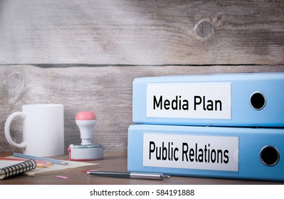 Public Relations And Media Plan. Two Binders On Desk In The Office. Business Background