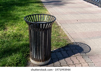 Public Rubbish Bin In A Park - Switzerland. Empty Trash Can In The Park