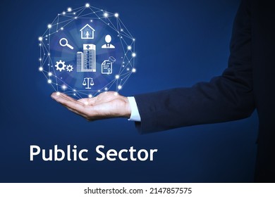 Public Sector Concept. Man Presenting Different Virtual Icons On Blue Background, Closeup