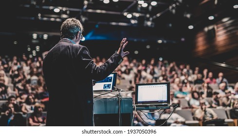 Public speaker giving talk at Business Event. - Shutterstock ID 1937050396