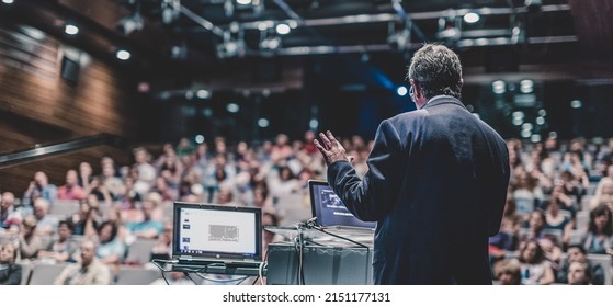 Public speaker giving talk at Business Event. - Powered by Shutterstock