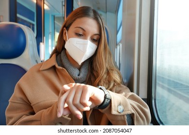 Public Transport Late. Business Woman On Train Looking At Smartwatch While Her Train Is Stopped On Railroad In The Middle Of Nowhere. People And The Delay With Transportation.