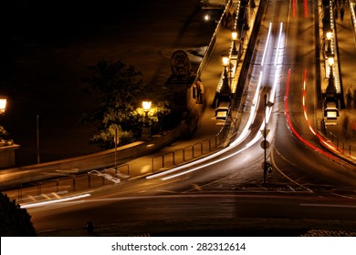 Public Transport On The Suspension Bridge At Night In Budapest