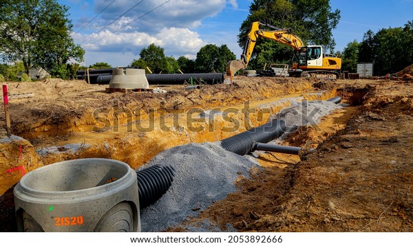 public works, construction of subdivision, passage\
of pipes