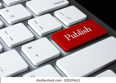 Publish on Red Enter Button on white keyboard - Shutterstock ID 533195611