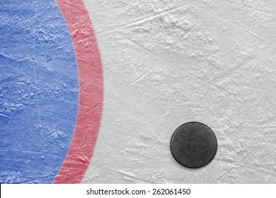 The Puck Lying On A Hockey Rink. Texture, Background