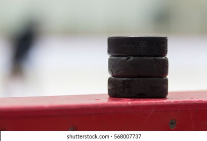 Puck On The Board In Hockey Arena