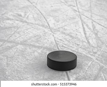 Puck On Ice Hockey Rink Scratched Surface